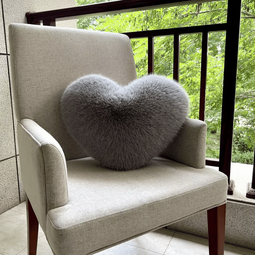 HUGNEST – Heart-shaped faux fur pillow for warm & modern living spaces